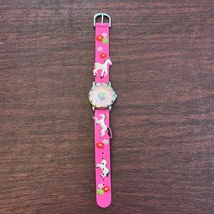 Kid’s pink horse watch